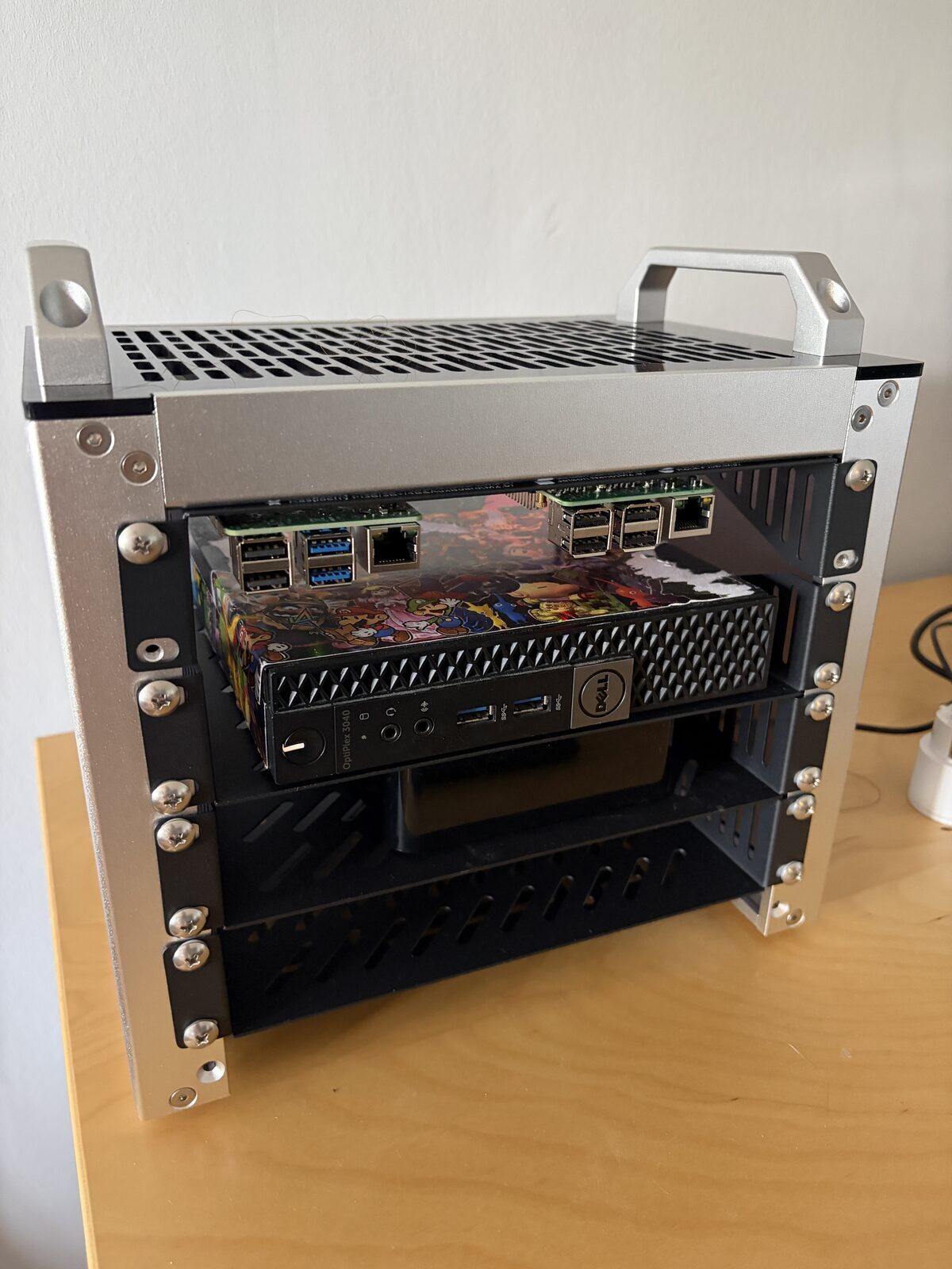 GeeekPi 4U server rack holding the Dell OptiPlex, two Raspberry Pis and an external HDD
